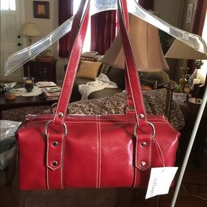 Villager red barrel shaped handbag