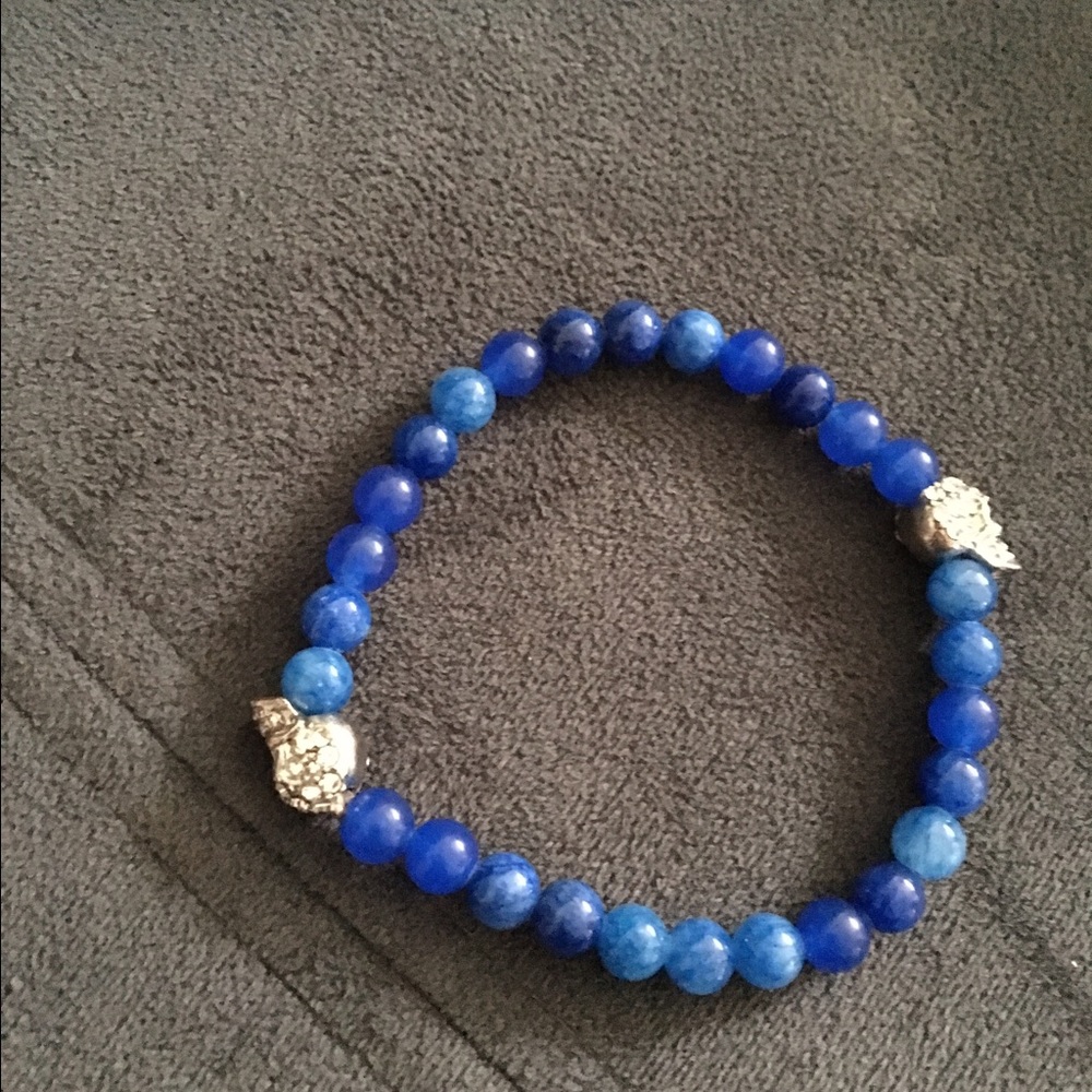 Nwot blue & silver skull bracelet