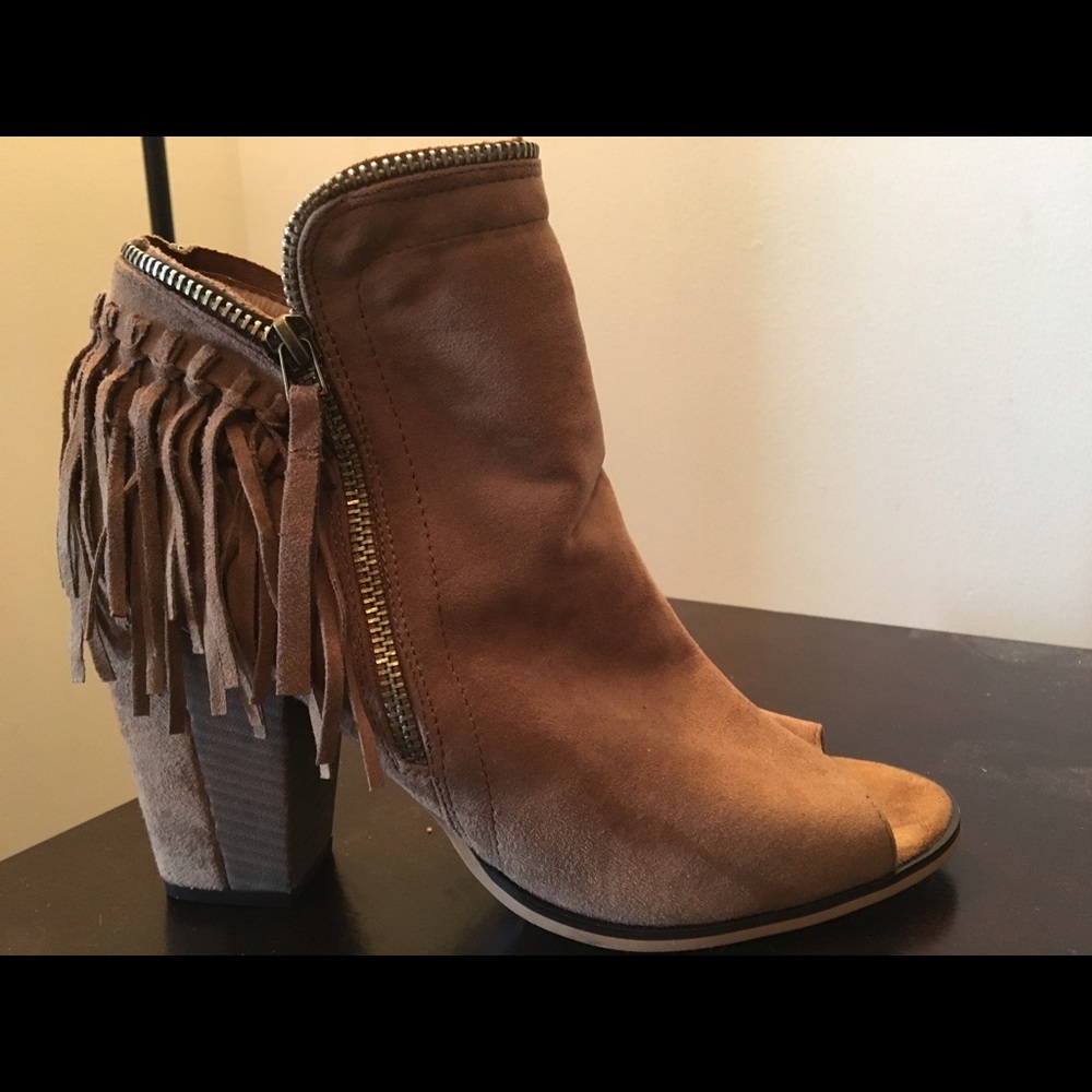 Practically new pair of open-toed suede booties.