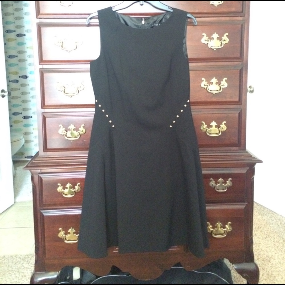 Flattering black sheath dress by Ivanka Trump