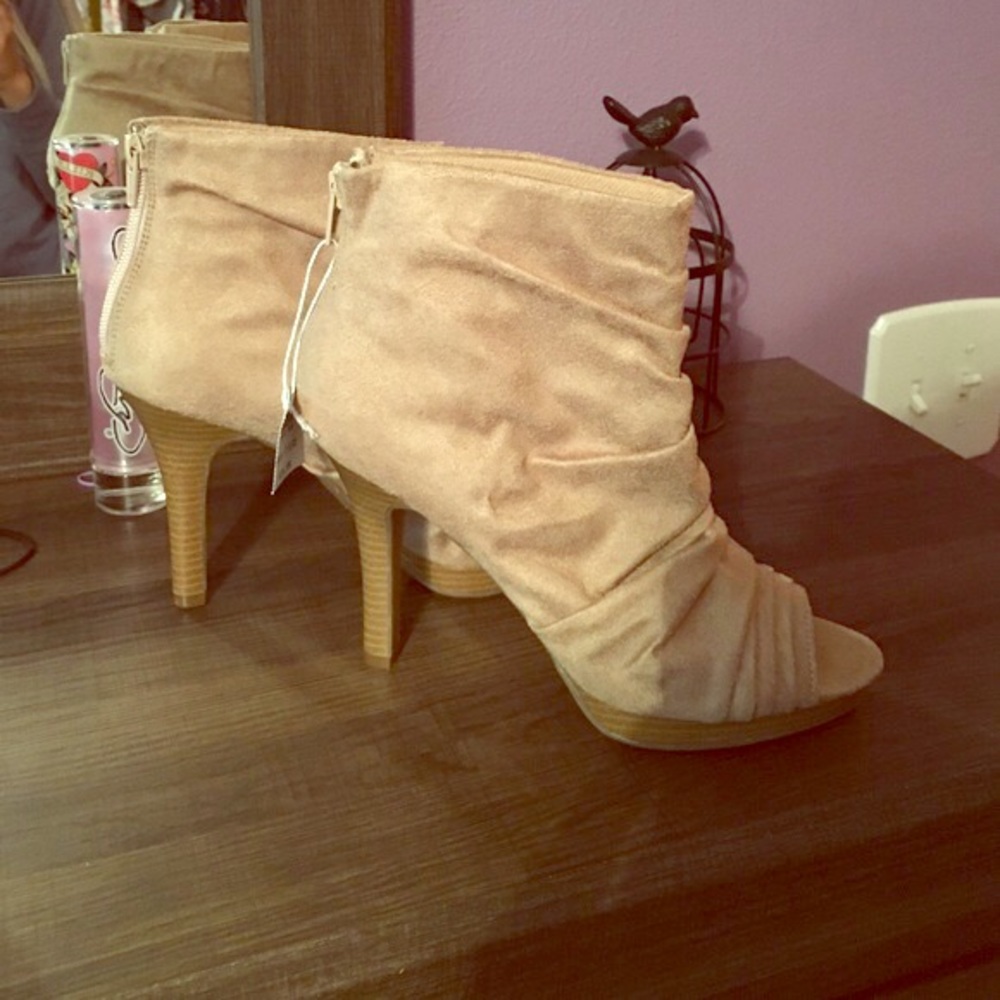 New with tags adorable tan open toe ankle booties.