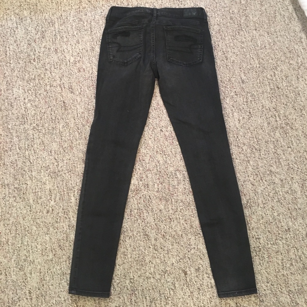 black distressed jeans