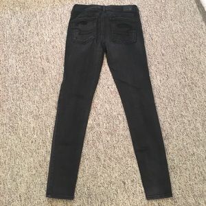 black distressed jeans