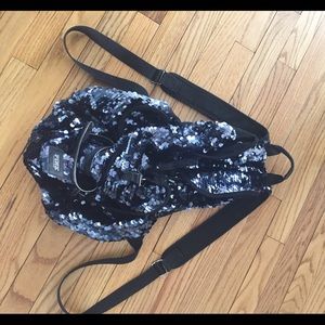 Sparkly Victoria Secret bag.