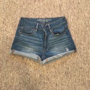 high waisted medium wash shorts
