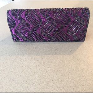 Nina fuschia beaded clutch