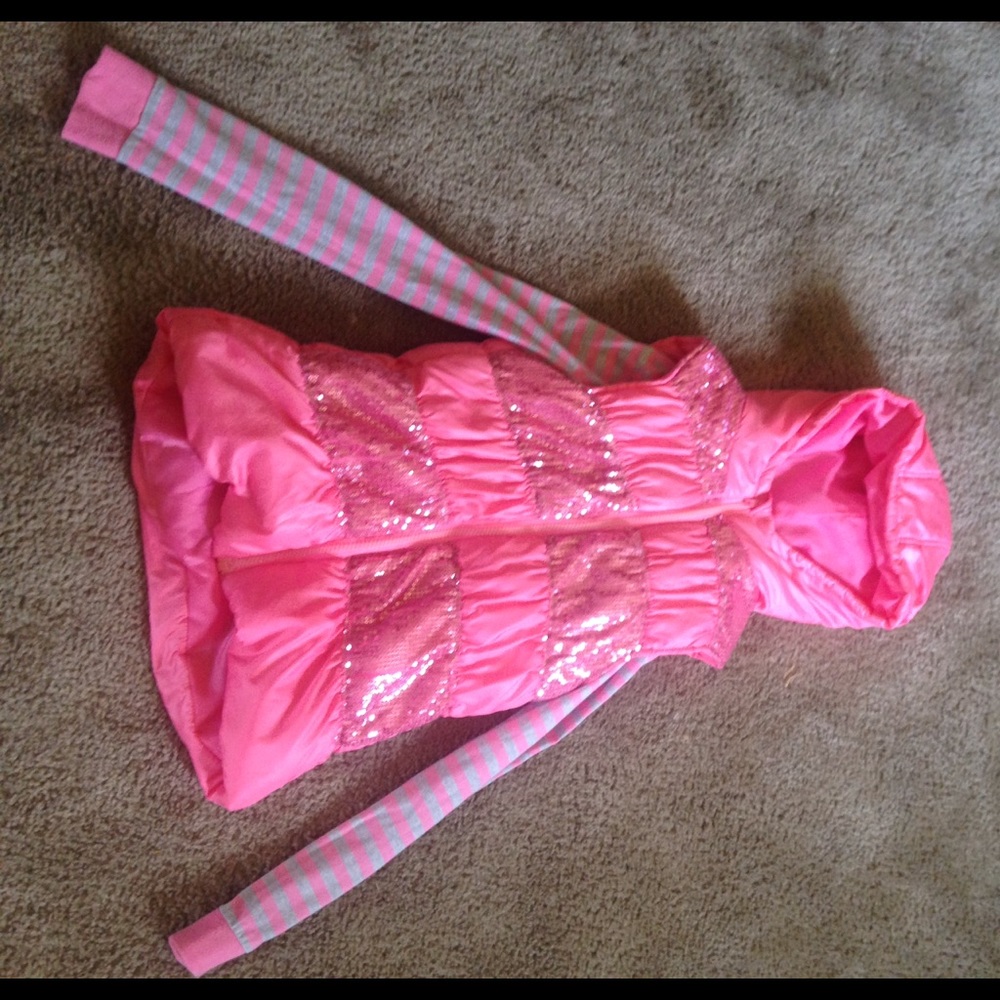 I am selling a long sleeve shirt with a vest.