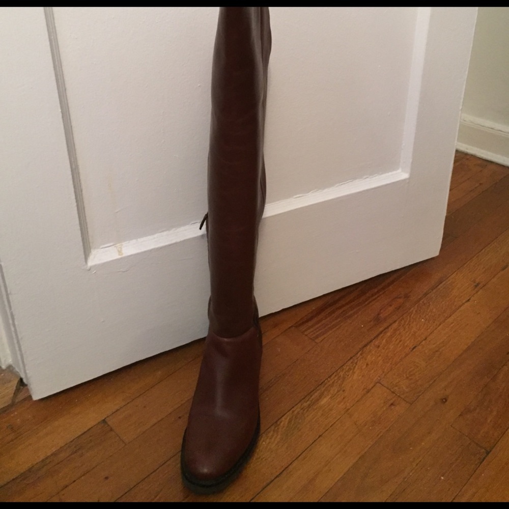 over-the-knee leather boots. Waterproof.