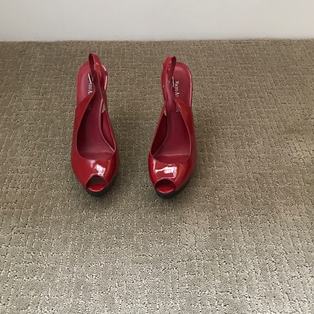 Red heel back pumps