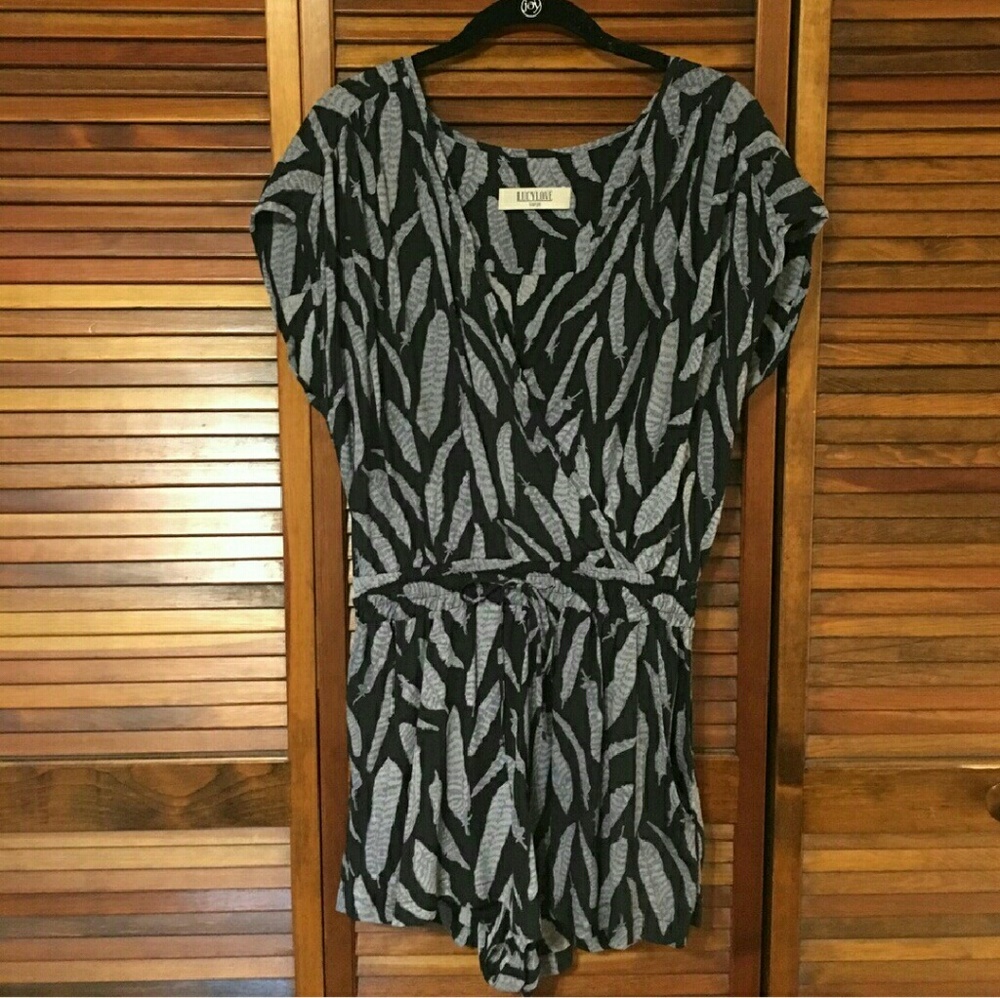 Lucy love feather romper size L