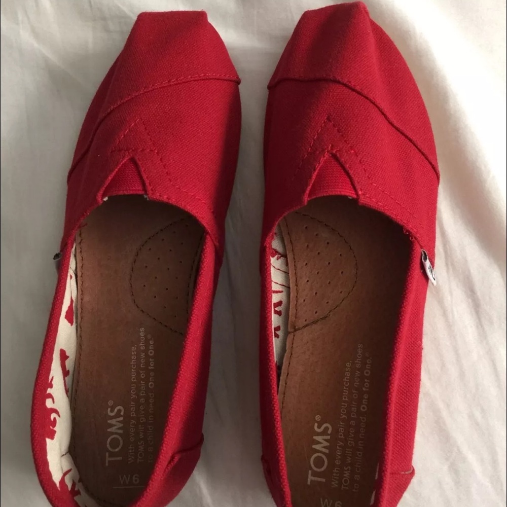Brand new Red Toms size 6