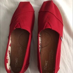 Brand new Red Toms size 6