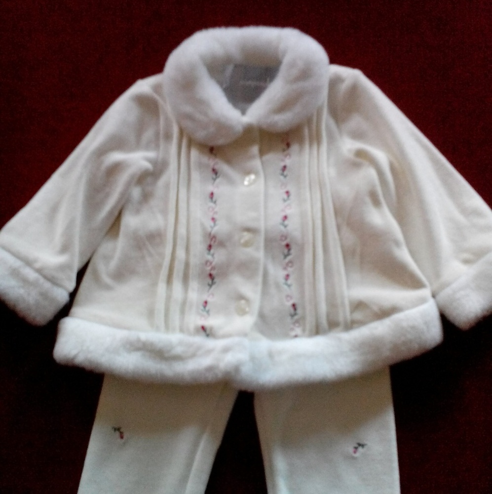 ,1- 2 piece off white toddler outfit.