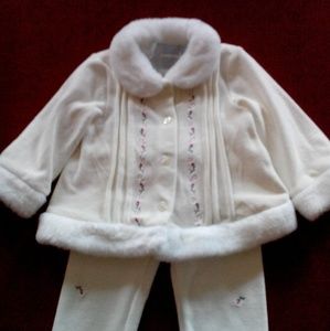 ,1- 2 piece off white toddler outfit.
