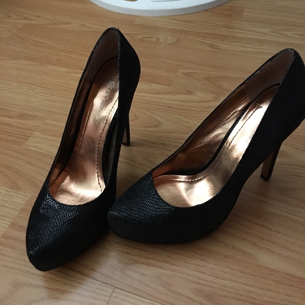 Barely worn black snakeskin heels