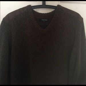 Shoulder patch green sweater