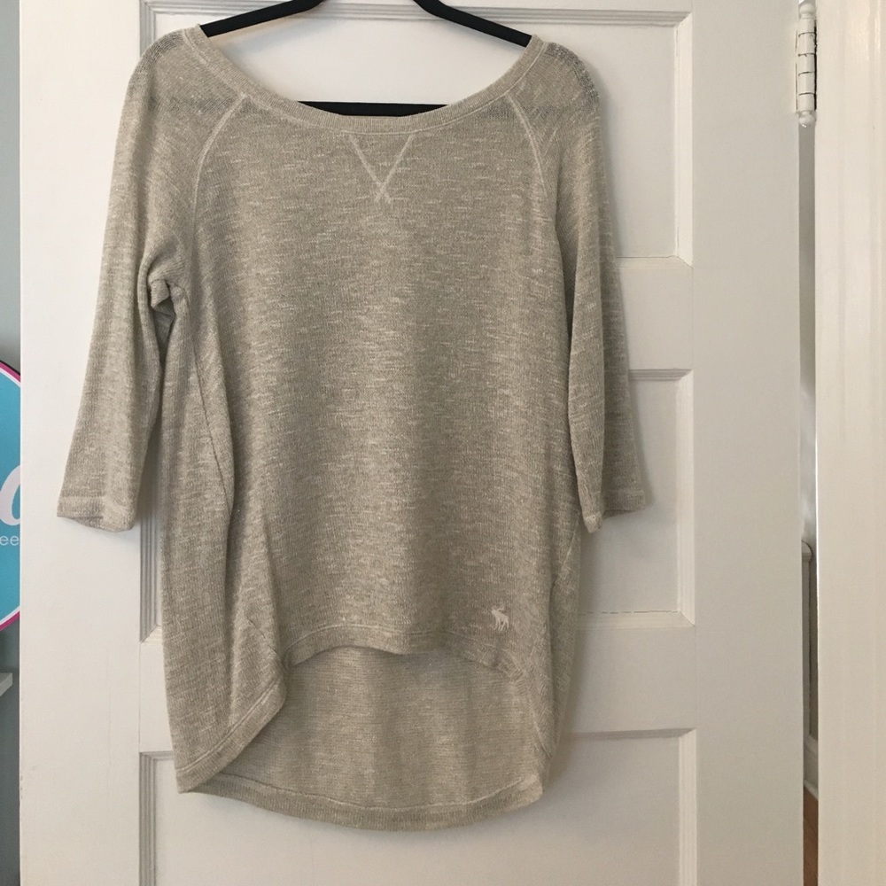 tan sweater with gold sparkles