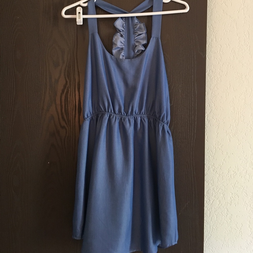 Sweet "denim" blue dress with ruffle back detail