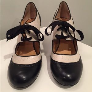 Black and white wedge shoes.