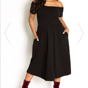 Black off the shoulder dress.... Never worn!