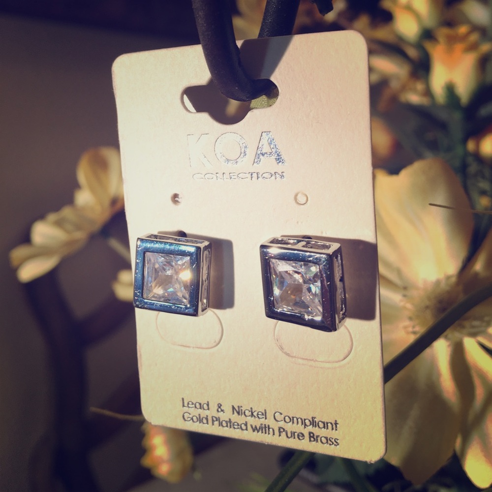 Silver square with square diamond looking studs