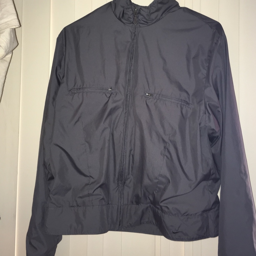 Gray Nike windbreaker