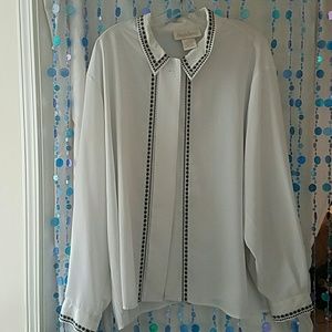 White button up shirt with black details