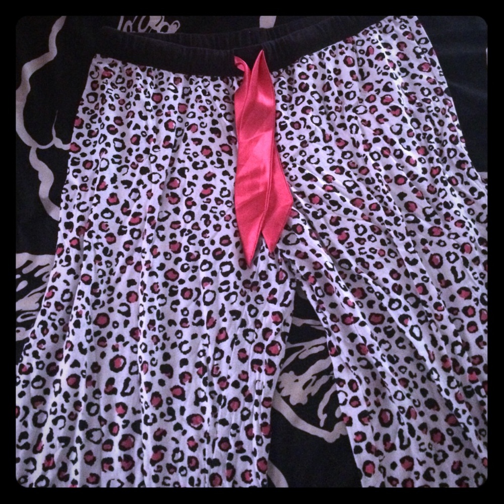 Black/white/pink cheetah print pajama pants.