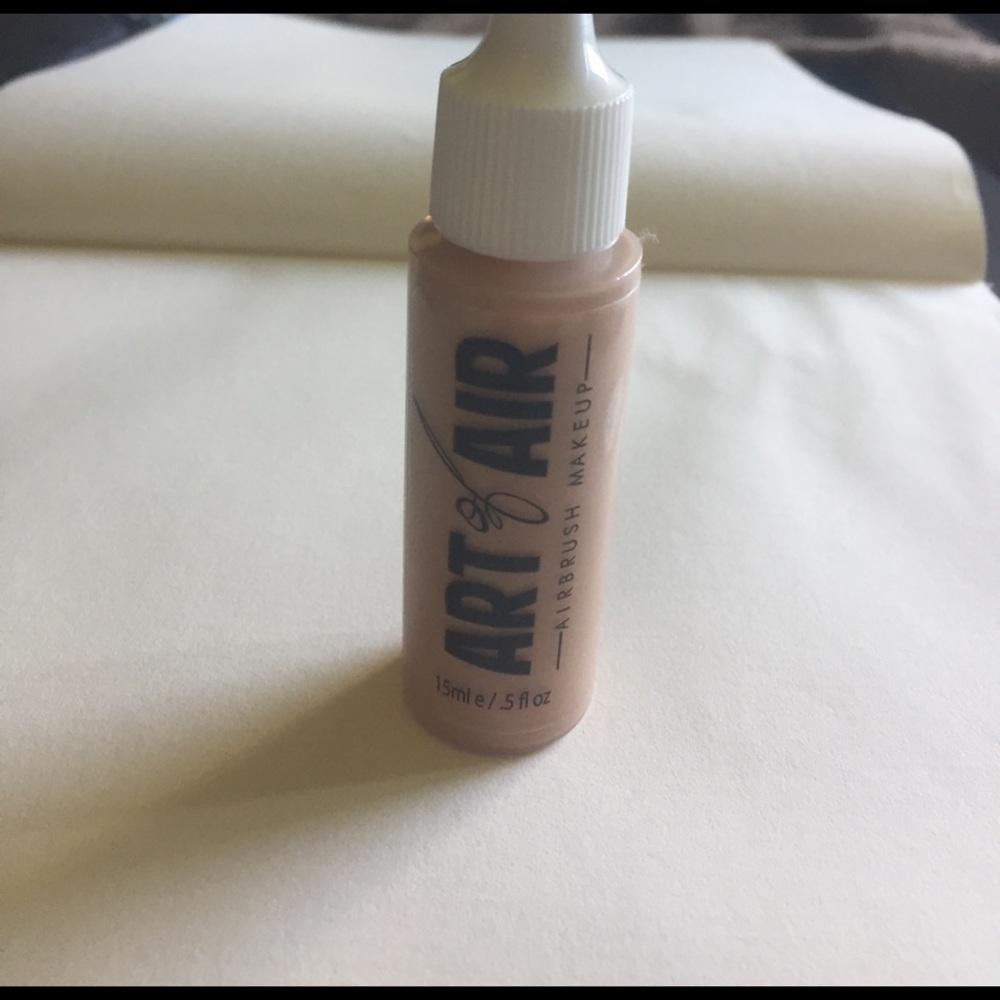 Suntan glo air brush makeup .5 fl oz