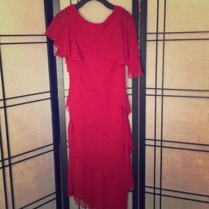 Formal a symmetrical tiered dress