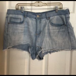 Light blue jean shorts.