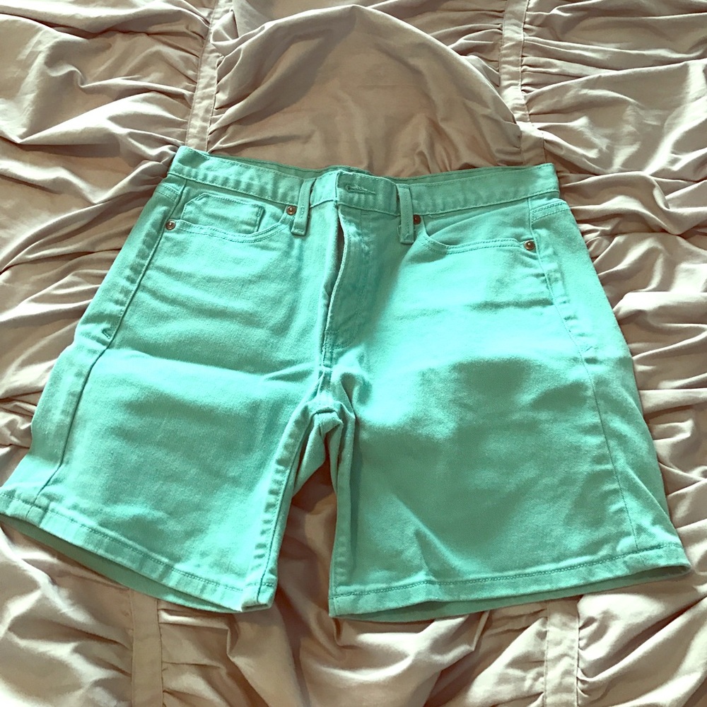 Jean shorts in a blue green color