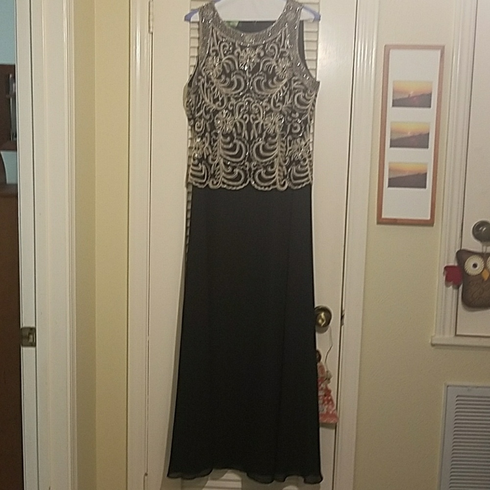 Beautiful black dress.   Sold