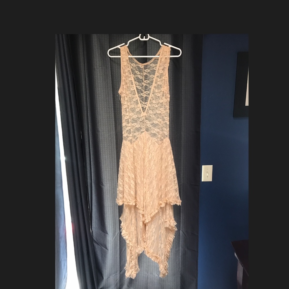Irregular tiered lace dress.
