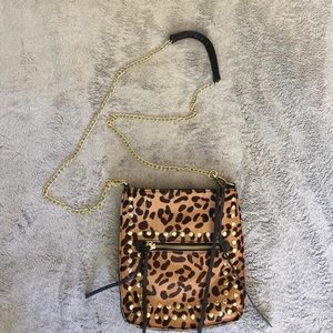 Steve Madden cheetah cross-body purse.