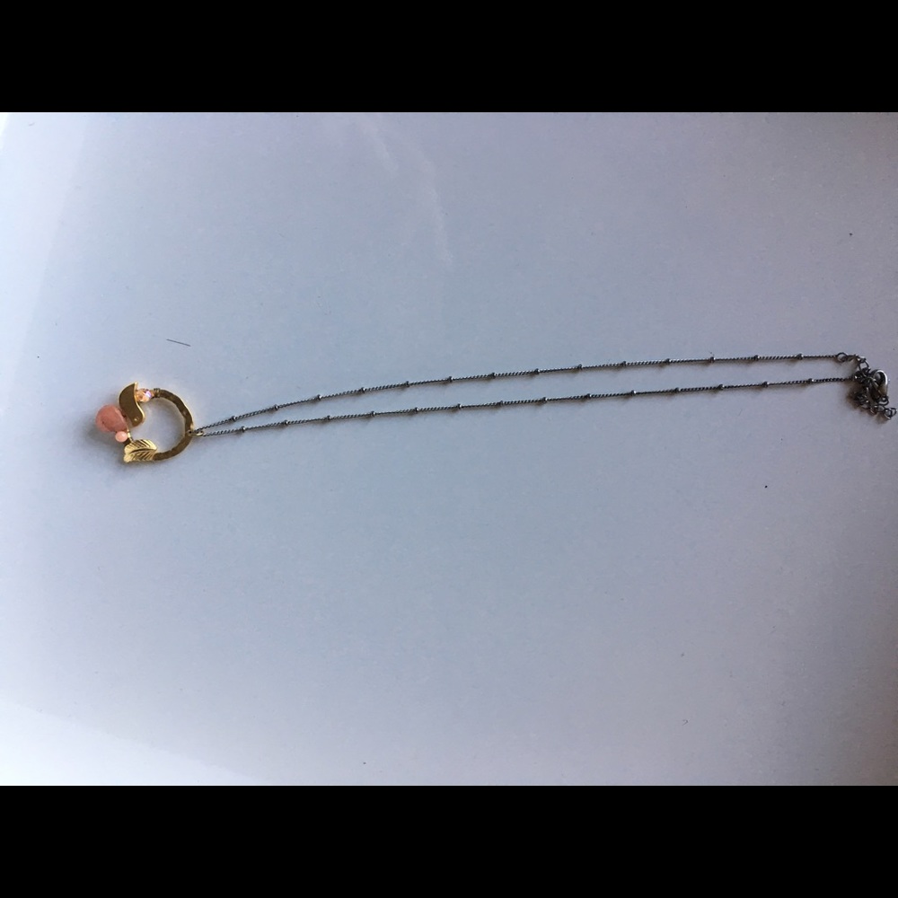 Delicate gold necklace.