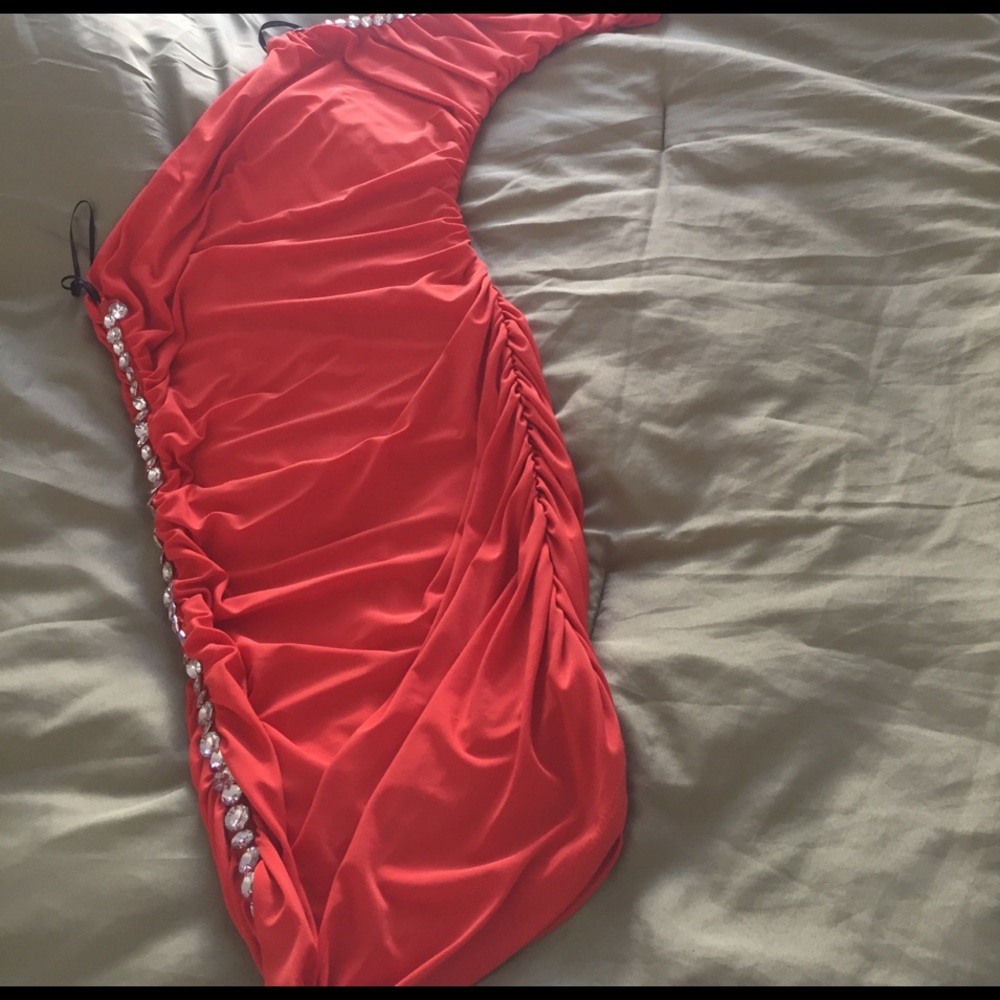 One sleeve dress , very body hugging.