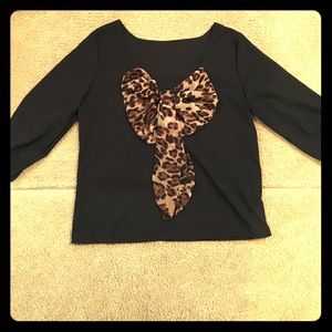 Sheer black shirt w/ low cut back w/ cheetah bow