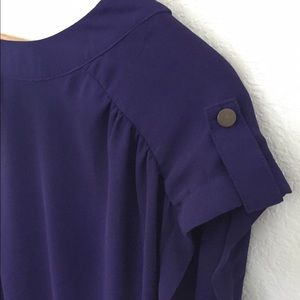 Purple short sleeve sheen waist shirt.