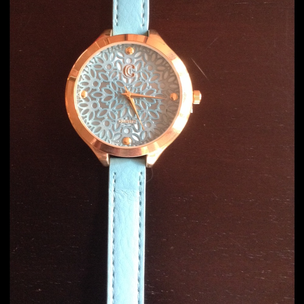 Turquoise and gold watch