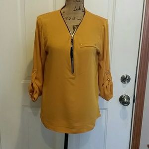 Mustard colored zup-front blouse
