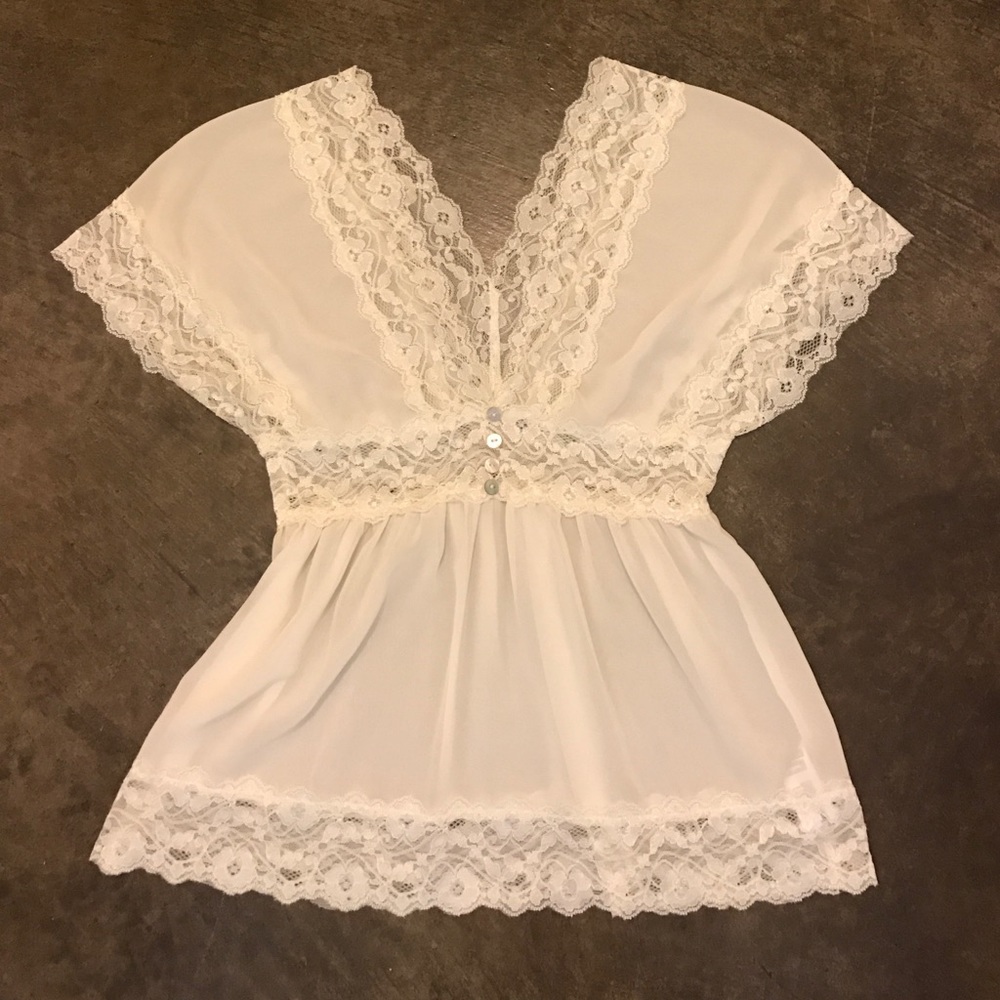 White blouse with lace accents