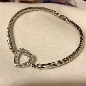 Sterling silver heart bangle with diamond accents