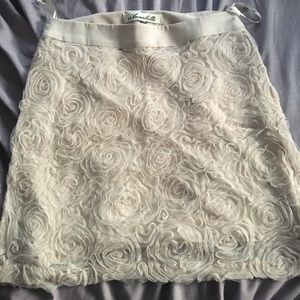Medium textured skirt, tan/off white color