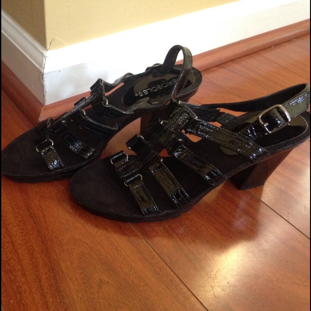 Brand new black strappy sandals.