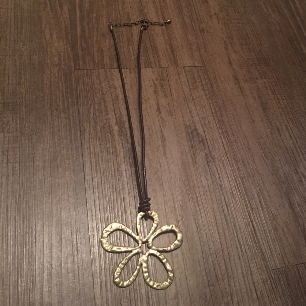 Brown leather necklace with gold flower pendant
