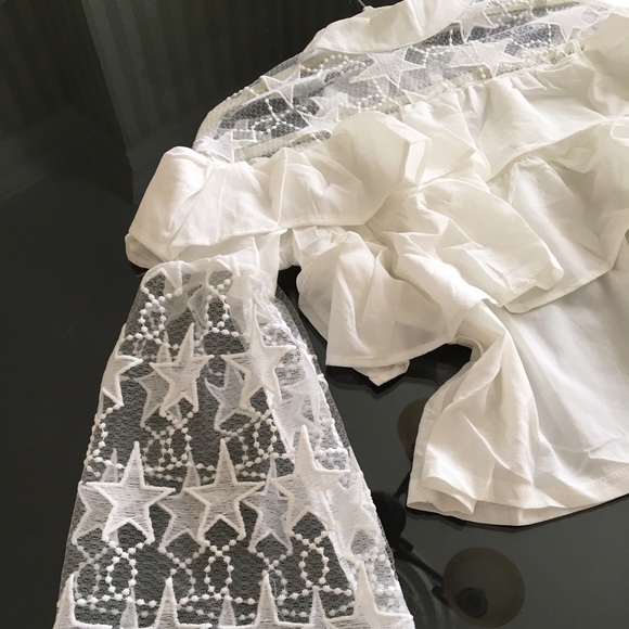 Sonia ruffle top with star appliqués. Top quality - Picture 5 of 6