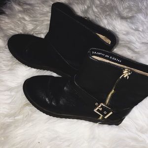 Black and gold boots