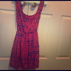 Charlotte Russe orangish with blue dress .
