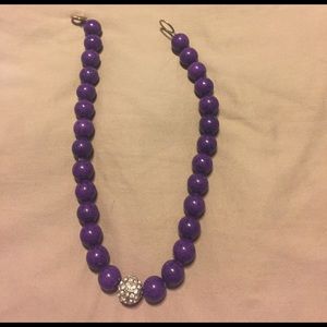 Purple beads with diamond bead center necklace